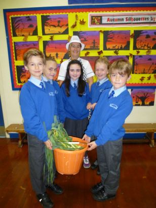 Eco Club hands home grown vegetables to school canteen